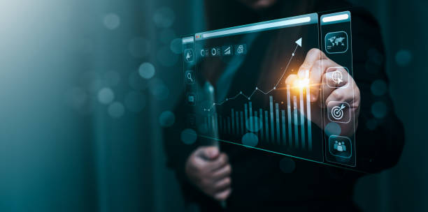 istock Businessman using laptop and analyzing economic growth, financial graph and business investment. planning strategy, stock market statistics, stock market trends, technical analysis strategy, value 2154802415