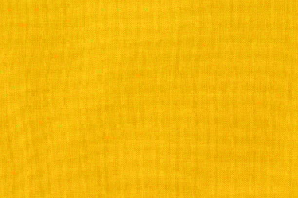 istock Yellow linen fabric cloth texture background, seamless pattern of natural textile. 2154803936