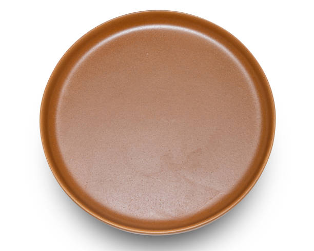istock Brown circle ceramics plate isolated on white background. 2154804414