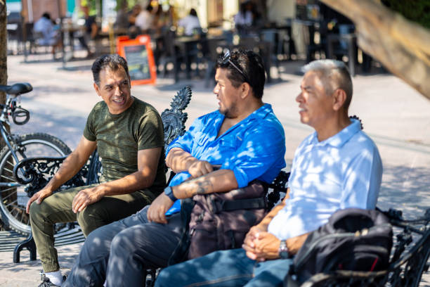 istock Three man friends +40 years talking each other 2154806880