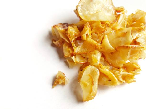 istock Sweet and spicy cassava chips isolated on white 2154809833