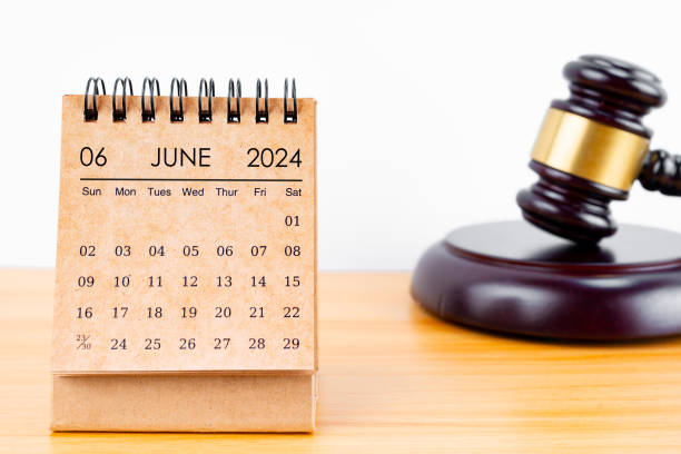 istock Desk calendar for June 2024 and judge's gavel 2154811588