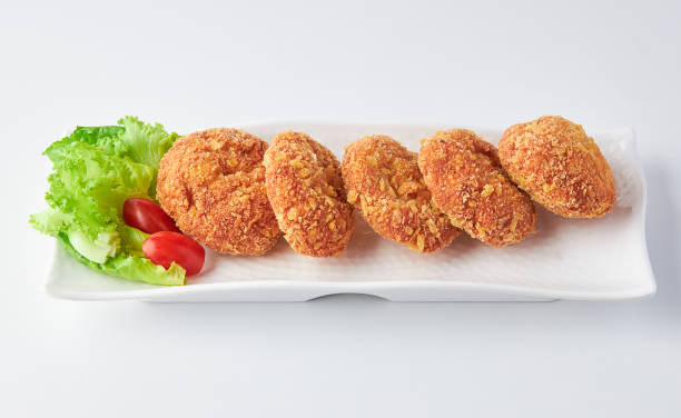 istock Shrimp Donut (Shrimp coated in flour and bread crumbs fried in oil) served on white plate isolated on white background. 2154814473