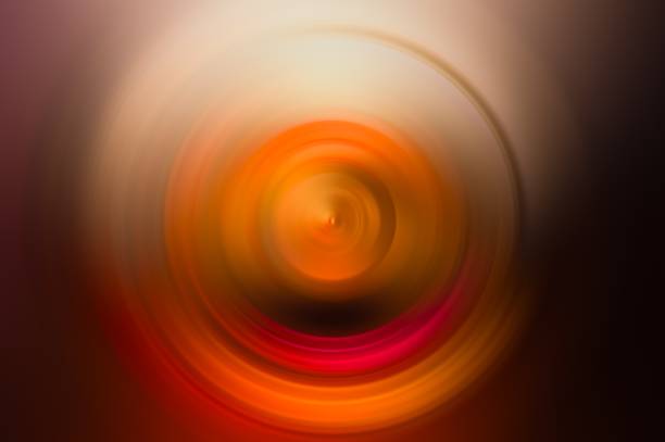 istock Abstract orange circle ripple effect ring pattern swirl shape smooth water droplet blurry capillary wave texture top view background 2154815628