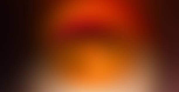 Blurred abstract orange red gradient color transit colourful frosted glass effect halloween background banner