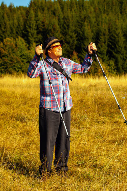 istock Senior man makes exercising in nature 2154818640