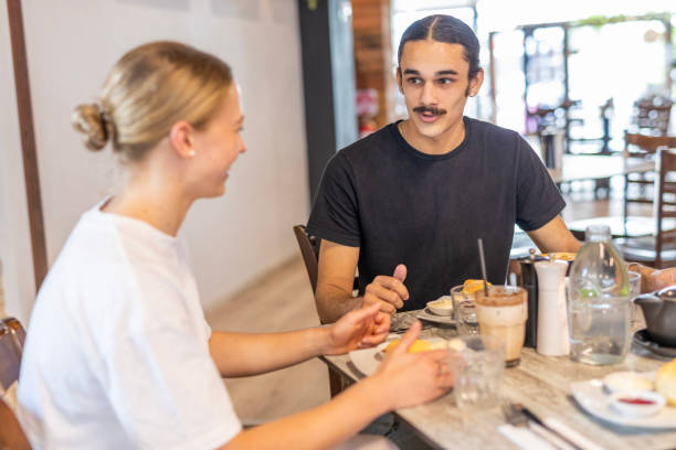 istock Young couple casual dining in a restaurant 2154820980