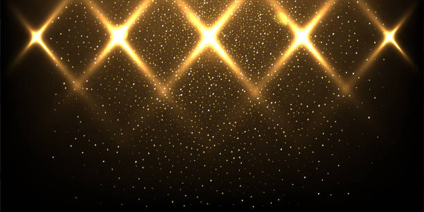 istock Stage lights with golden glitter vector realistic illustration. Abstract gold spotlights with rays on dark background. Bright flashes and sparkles 2154821573