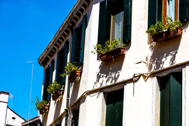 istock Typical facade of house with windows in Venice 2154822264