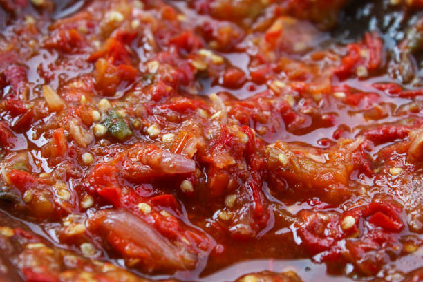 istock red chili sauce close up 2154823068