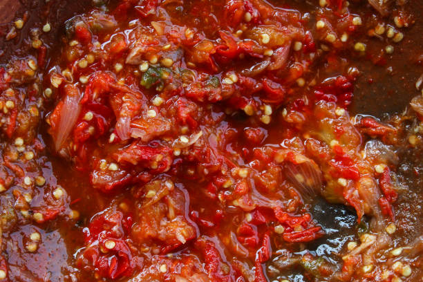 istock red chili sauce close up 2154823074