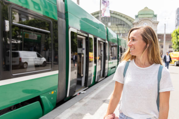 istock Woman Smiling at a Train Station 2154824412