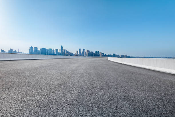 istock Empty asphalt road and modern city skyline background in Hangzhou 2154824439