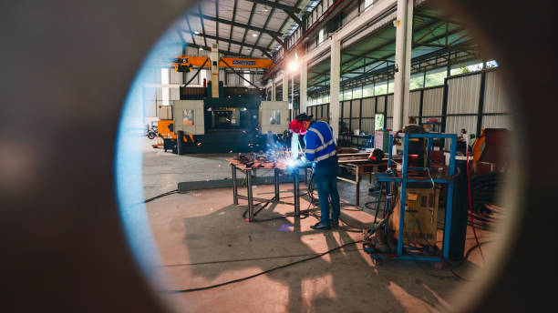 istock Worker in steel factory. 2154824471