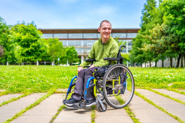 istock Disabled man with cerebral palsy in the university campus 2154824873