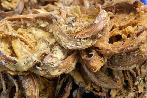 istock pile of fried sea fish. seafood. 2154825212