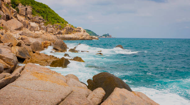 istock Waves Crashing Against Rocky Coast 2154825497