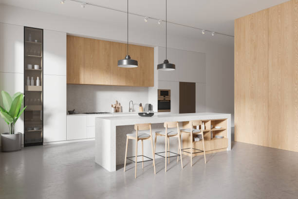 istock Stylish home kitchen interior with bar counter and shelves with kitchenware 2154828930