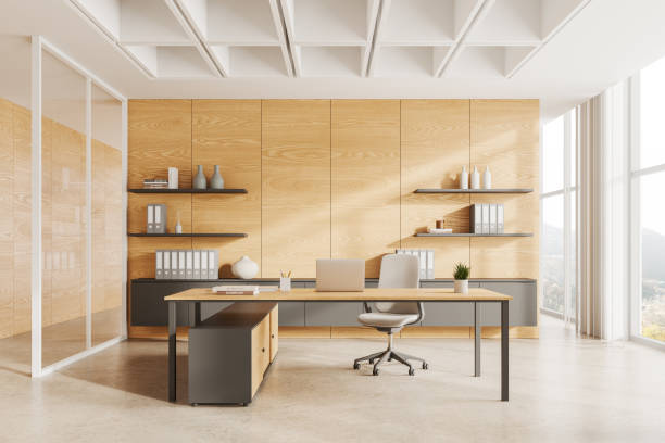 istock Wooden office interior with work desk and laptop, panoramic window 2154828992