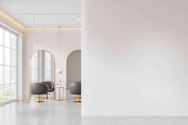 istock White beauty salon interior with armchairs, table near window. Mockup wall 2154829205