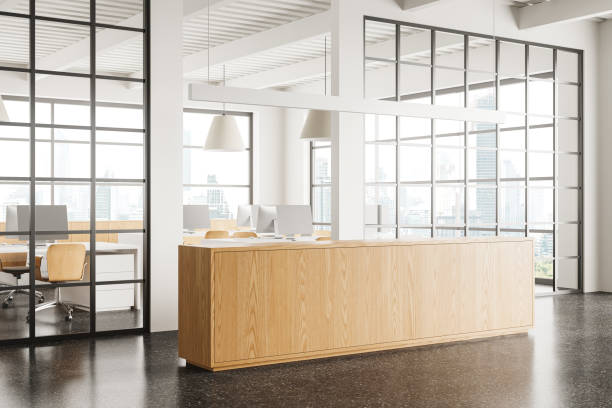 istock Cozy office interior with reception desk and coworking space, panoramic window 2154829288