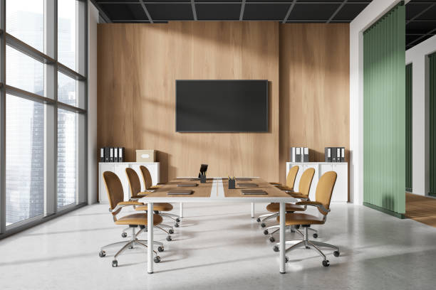 istock Wooden conference interior with table and chairs, tv screen and panoramic window 2154829386