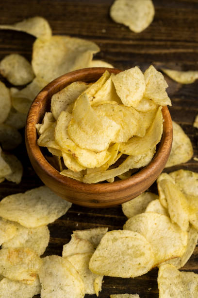 istock pile of potato chips on the table 2154832206