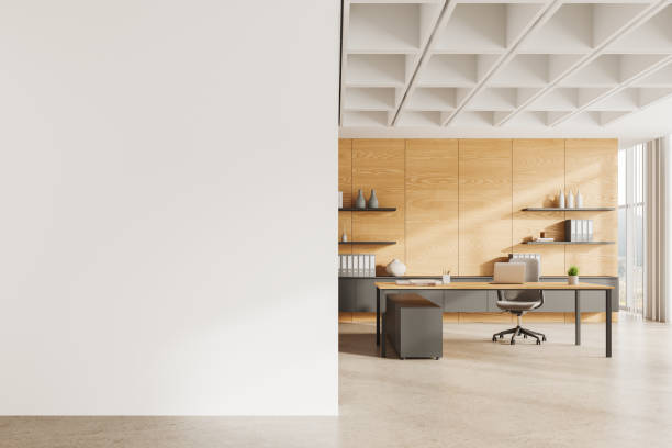 istock Modern office interior with work desk and laptop, panoramic window. Mock up wall 2154833901