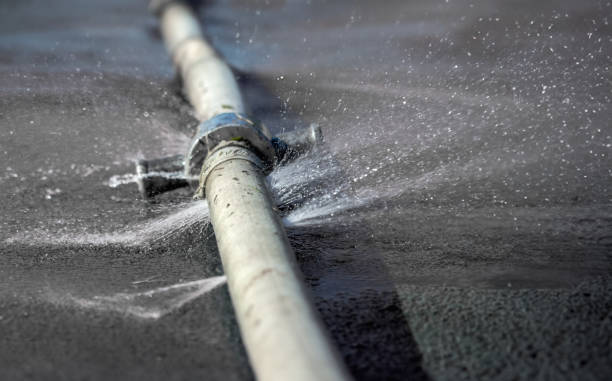 istock Water leaking from hole in a hose. 2154836510