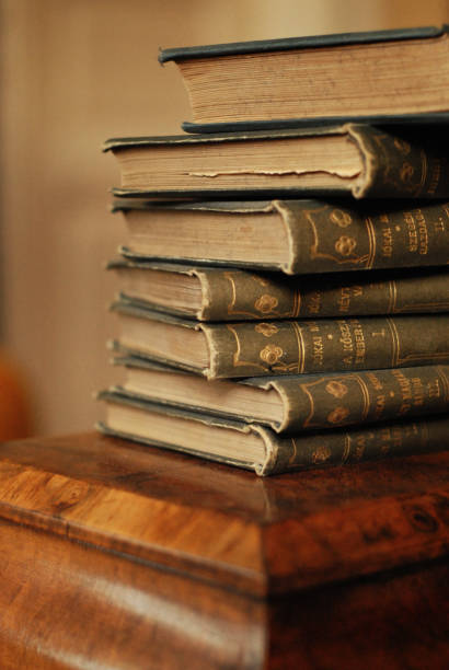 istock Stack of Antique Books on Vintage Wooden Box 2154837531