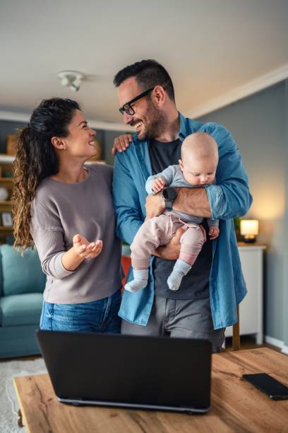 istock Family with a baby at home. 2154838305