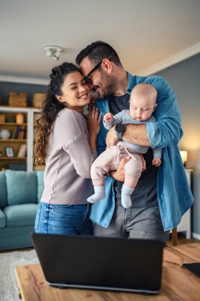 istock Family with a baby at home. 2154838985