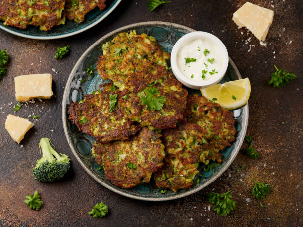 istock Fried Broccoli fritters or pancakes with parmesan and mozzarella cheese 2154839048