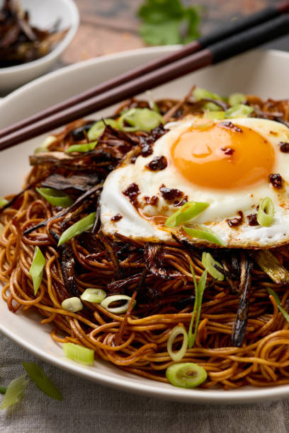 istock Scallion Oil Noodles with fried egg on top and chilli oil 2154839345