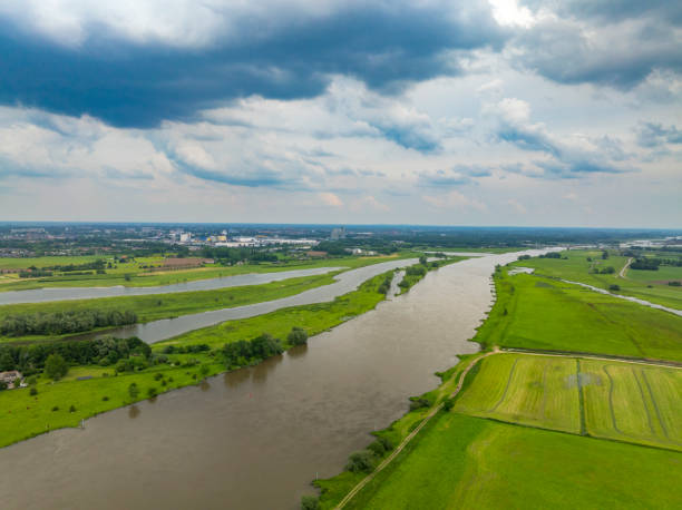istock IJssel river springtime landscape with a dark sky above 2154841022