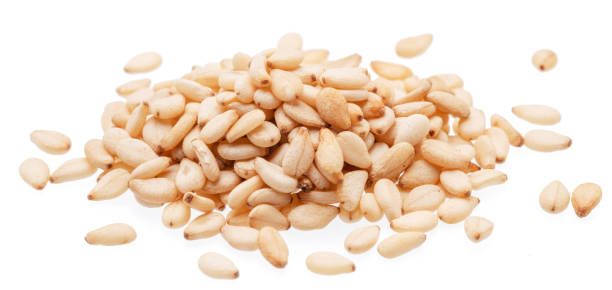 istock White seeds of sesame isolated on white background. 2154841296