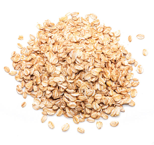istock Wheat flakes isolated on white background. Top view. 2154841323