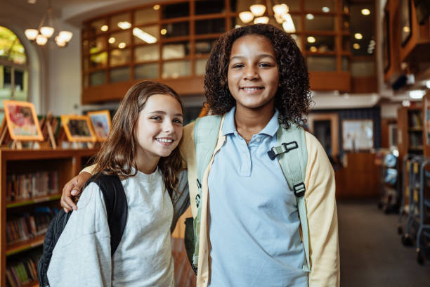 istock Education in USA - Diverse school children in library 2154842096