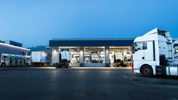Trucks in front of maintenance garage