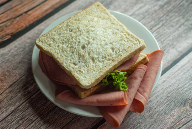 healty chicken sandwich with blurry salad