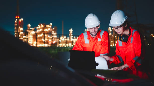 istock Two night shift engineers remotely check the operation of the facilities. 2154847833