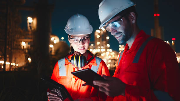 istock Two night shift engineers remotely check the operation of the facilities. 2154847834