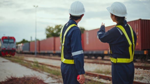 istock Two workers inspect a shipping container using a tablet. Concepts of inventory management and logistics 2154847908