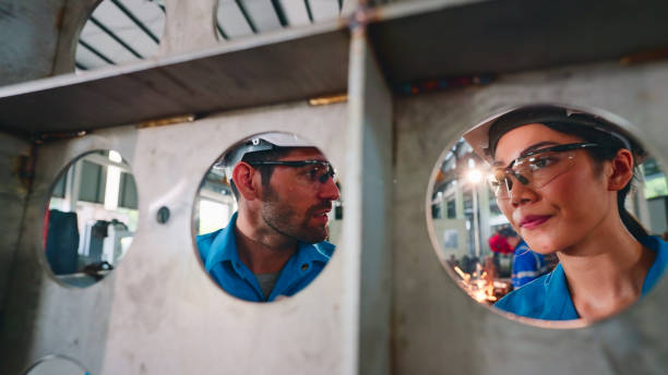 istock Quality inspectors working in a steel factory. 2154848101