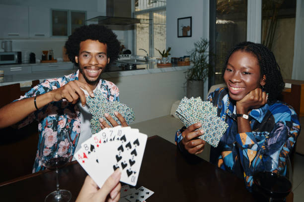 istock Friends Playing Cards at Home 2154850642