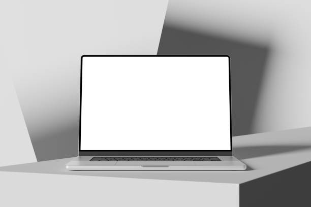 istock Front view of an open laptop with a blank screen, placed on an abstract shapes. Minimalistic and clean workspace with a neutral background, perfect for adding custom content on the laptop screen. 2154850788