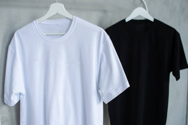 istock Black and white T-shirt hanging on a hanger, layout 2154854408