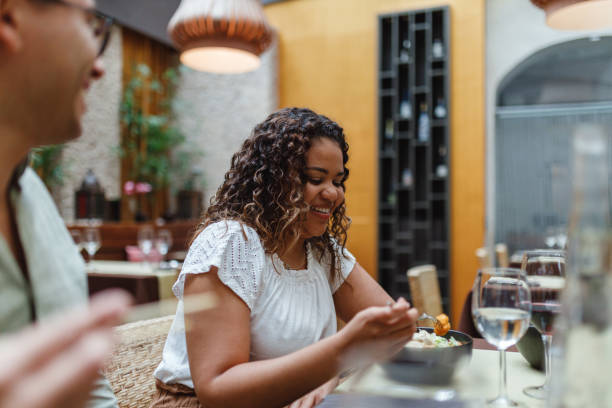 istock Diverse Friends Dining Together in Restaurant 2154858778