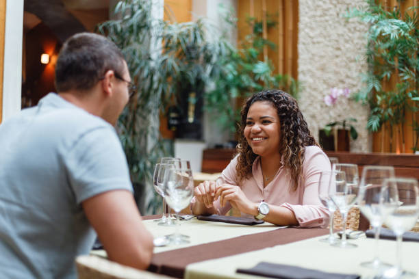 istock Friends Dining in a Cozy Restaurant 2154858809