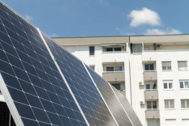 istock Solar panels near an apartment building 2154859442